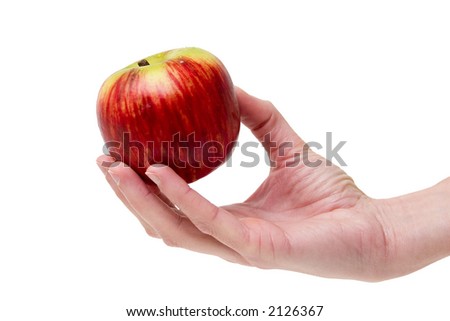 This apple is for you. Girl's hand offering a red/yellow apple