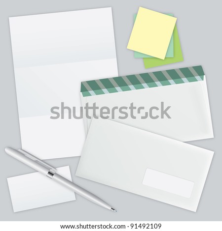 white piece of paper, two envelopes and colored leaflets for notes. raster version for web design and high quality print