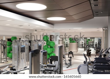 Interior of modern health and fitness club