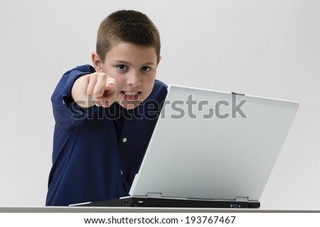 Boy wining computer games