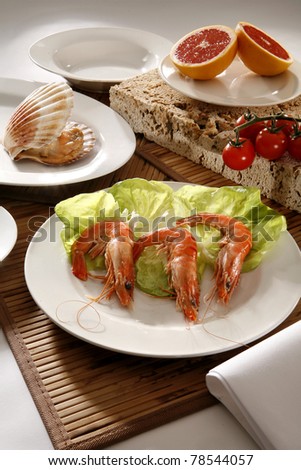 Sea food on white dishes