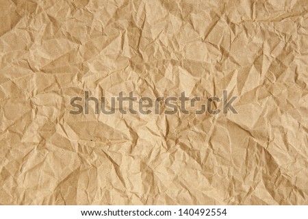 Crumpled brown parcel packing paper background texture