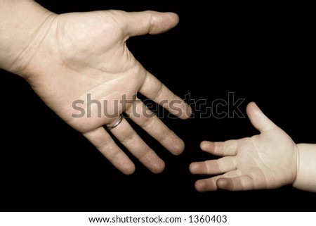 child reaching for hand child reaching for hand