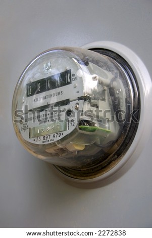 an electrical meter in a gray box