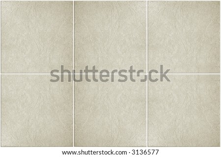 neutral colored floor tile with white grout