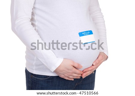 a pregnant mother with blue name tag on belly