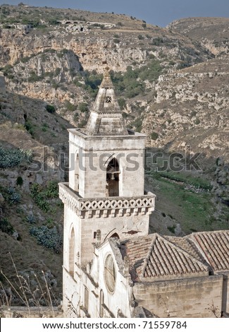 Church tower between the mountain in south Italy