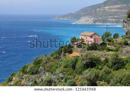 Single house on shore of Corsica (France)