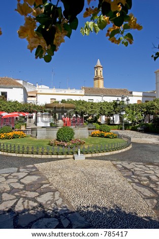 Orange Square in Estepona with pretty gardens and flowers on a sunny day on the Costa del Sol in Spain