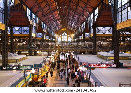 BUDAPEST, HUNGARY - 27 OCTOBER 2014:People shopping in the Great Market Hall on October 27, 2014 in Budapest, Hungary. Great Market Hall is the largest indoor market in Budapest, built in 1896.