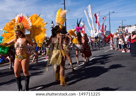 MARGATE, UK-AUGUST 4:  Dancers from the Great British Carnival group entertain the thousands of people who turned up to watch Margate\'s annual carnival. August 4, 2013 in Margate, UK