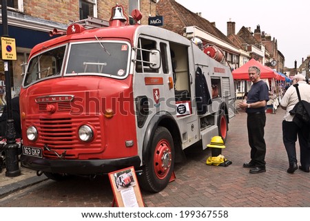 Faversham, UK- MAY 17: A vintage fire Engine is on display on the streets of Faversham as part of the Transport Weekend that attracts thousands of visitors to the town. May 17 2014 in Favershan UK.