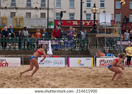 MARGATE,UK-AUGUST 16: Competitors play on Margate Main Sands for the finals of Volley Ball England Beach Tour. August 16, 2014 in Margate, UK.