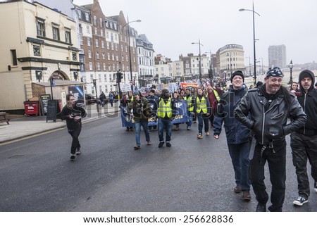 MARGATE,UK-FEBRUARY 28: Anti UKIP and racism protesters, with banners, placards and music, march on UKIP'S conference in Margate's Winter Gardens. February 28, 2015 in Margate Kent, UK.