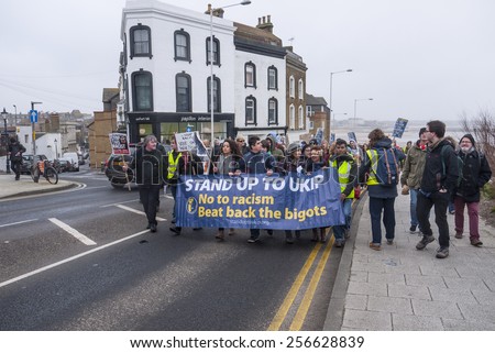 MARGATE,UK-FEBRUARY 28: Anti UKIP and racism protesters, with banners, placards and music, march on UKIP\'S conference in Margate\'s Winter Gardens. February 28, 2015 in Margate Kent, UK.