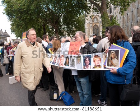LONDON, UK-SEPTEMBER 17: Protesters About the Pope's Visit to the UK, Greet the Crowds Outside Westminster Abbey Sept 17, 2010 in London