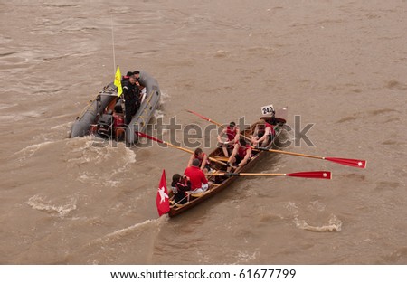LONDON, UK- SEPTEMBER 25: Boat Crews Racing Past Westminster, In The Annual Great River Race On The Thames. London,September 25, 2010