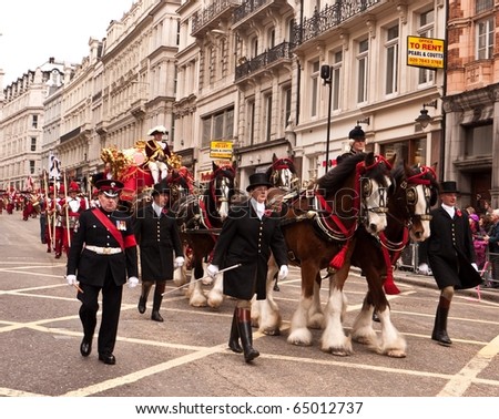 LONDON, UK- NOVEMBER 13: The Lord Mayor in the Famous Gold Carriage Travels Down Ludgate Hill in the 795th Annual Lord Mayor's Parade on November, 13 2010 in London