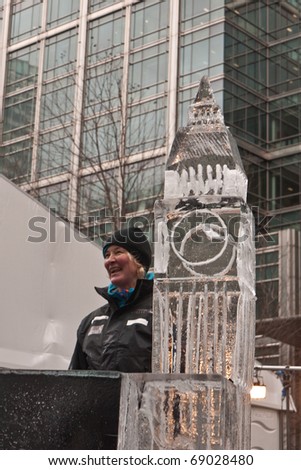 LONDON, UK- JANUARY 15: A unidentified member of the Dutch Ice Sculpting Team at Work on a Sculpture of Big Ben at the Annual London Ice Sculpting Festival, on January 15, 2011 in London, UK.