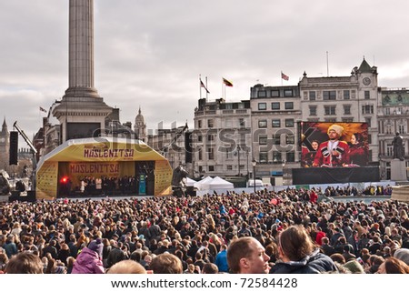 LONDON, UK - MARCH 6: Thousands of people celebrate the Russian Festival of Maslenitsa, with a live link to Moscow on the big screen. March 6, 2011 in London UK.