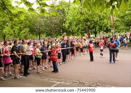 LONDON, UK- APRIL 17: Runners gather at one of the starting lines in Greenwich Park, for the annual London Marathon on April 17, 2011 in London UK.