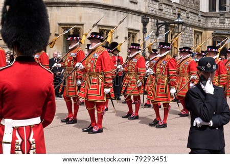WINDSOR, UK- JUNE 13: Members of the Queen\'s Body Guard of the Yeoman of the Guard, parade in Windsor Castle, part of the Most Noble Order of the Garter ceremonies,June 13, 2011 in Windsor, UK
