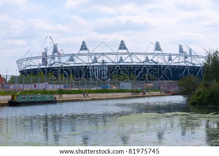 LONDON, UK-JULY 31: View of the Olympic Stadium from Hackney Wick across the canal. The Olympic park is under construction for the London 2012 Olympic Games, Stratford. July 31, 2011 in London UK