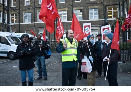 LONDON, UK- NOVEMBER 30:Striking workers from the heath and public sectors outside the Royal London Hospital, in response to government  planned  changes to pensions. November 30, 2011 in London UK.