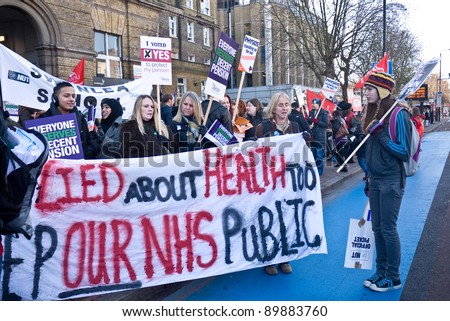 LONDON, UK- NOVEMBER 30:Striking workers from the heath and public sectors outside the Royal London Hospital, in response to government  planned  changes to pensions. November 30, 2011 in London UK.