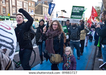 LONDON, UK- NOVEMBER 30: Health workers and public sector workers march to the pickets and protesters at the Royal London Hospital, protesting against pension changes. November 30, 2011 in London UK.