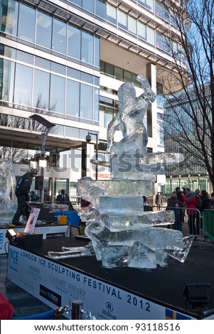 LONDON, UK- JANUARY 14: The Swedish ice sculpture under construction at the London Ice Sculpting Festival. The Annual festival was held in Canary Wharf, January 14, 2012 in London UK.