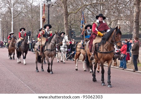 LONDON, UK-JANUARY 29: Mounted members of the English Civil War Society in historical costume, lead the parade to commemorate the execution of King Charles I  January 29, 2012 in London UK