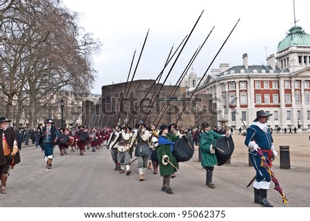 LONDON,UK-JANUARY 29:Members of the Kings Army with drums and pikes,part of the English Civil War Society commemorate the execution of King Charles I,Horse Guards parade. January 29, 2012 in London UK
