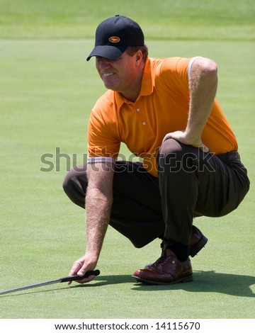 CROMWELL, CT - JUNE 21: Golfer Steve Elkington lines up his put on the 5th green at the Travelers Championship at TPC River Highlands Golf Course on June 21, 2008 in Cromwell, CT
