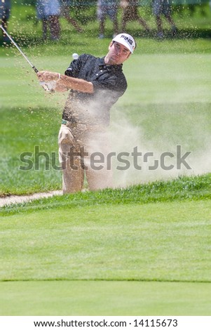 CROMWELL, CT - JUNE 21: Golfer Bubba Watson chips out of the sand trap at hole 5 at the Travelers Championship at TPC River Highlands Golf Course on June 21, 2008 in Cromwell, CT
