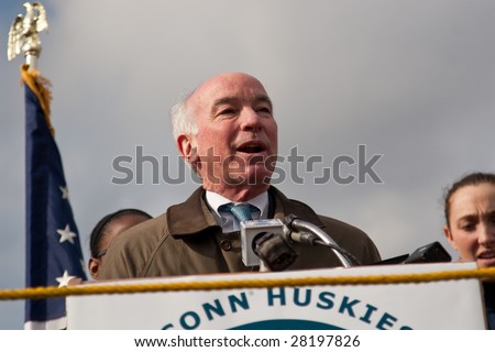 WINDSOR LOCKS, CT - APRIL 8: US Rep Joseph Courtney speaks to the crowd to welcome the UCONN Women\'s Basketball NCAA Champs at a homecoming rally held at Bradley Airport on April 8, 2009 in CT.