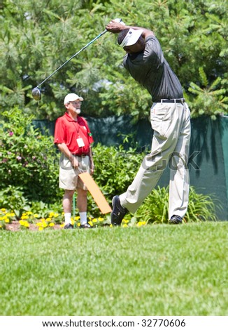 CROMWELL, CT - JUNE 27: Golfer Vijay Singh tees off on the 10th tee at the Travelers Championship at TPC River Highlands Golf Course on June 27, 2009 in Cromwell, CT
