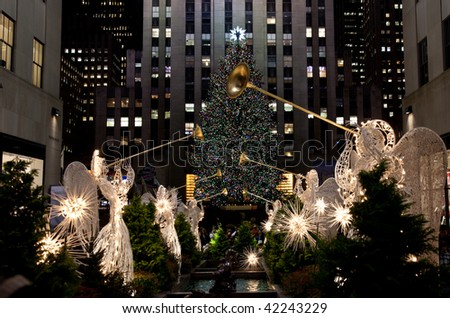 NEW YORK - DECEMBER 4:   The crowds flock to see the lit tree and other decorations at Rockefeller Center on the evening of December 4, at New York City, NY.