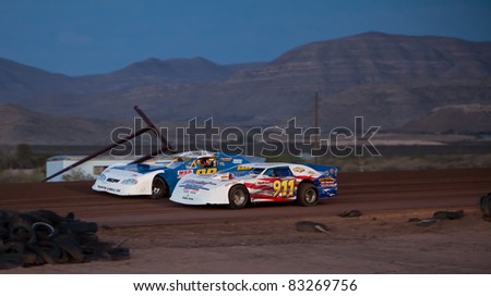 EL PASO, TEXAS – AUG 19: UniFirst Night at El Paso Speedway Park saw the grandstands full as the Late Models  worked on rolling the 3/8 mile clay oval smooth on August 19, 2011 in El Paso, Texas.