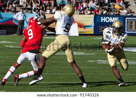 EL PASO – DECEMBER 31:  Georgia Tech\'s Embry Peeples (24) is blocked by Steven Hill (5) during UTAH’s overtime 30 to 27 win over Georgia Tech at the Sun Bowl on December 31, 2011 in El Paso, Texas.