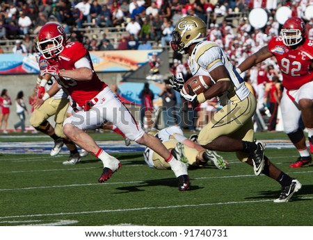 EL PASO – DECEMBER 31:  Georgia Tech's Emery Peeples (24) carries the ball during UTAH’s overtime 30 to 27 win over Georgia Tech at the Sun Bowl on December 31, 2011 in El Paso, Texas.