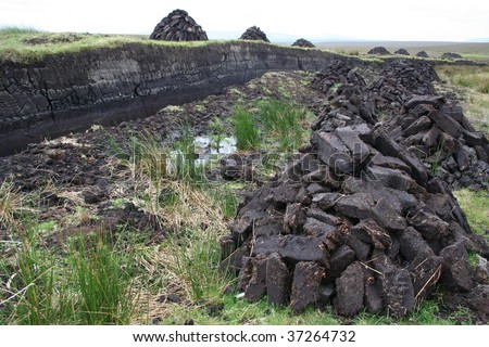 Peat bogs and dug up peat piles for home fires, Achill Island, County mayo, Ireland.