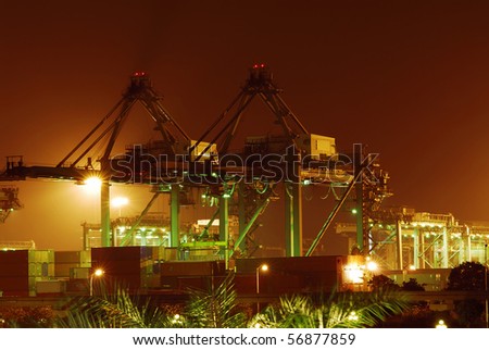A view of a busy container yard at night