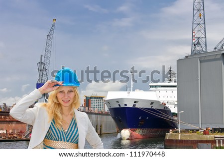 Woman engineer shipbuilder at the shipyard.