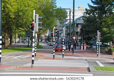 DORDRECHT, THE NETHERLANDS - SEPTEMBER 28: Employed traffic lights at the   crossroads on September 28, 2013 in Dordrecht, Netherlands.