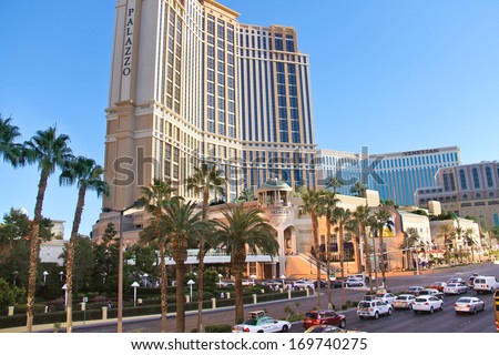 LAS VEGAS, NEVADA, USA - OCTOBER 21, 2013 :  Cars on the Strip  in Las Vegas, Nevada. 40 million tourists visited Las Vegas in 2012