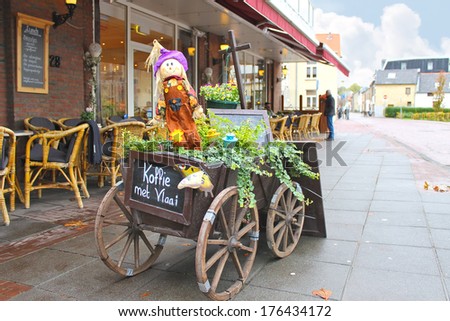 VALKENBURG, THE NETHERLSNDS - NOVEMBER 3, 2012 : Decorative cart outside the restaurant  in Valkenburg. Netherlands