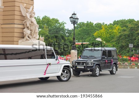 ODESSA, UKRAINE - JULY 7,2013 : Wedding cortege near the entrance to Odessa Opera House  in Odessa. Odessa is one the most original and picturesque city of Ukraine