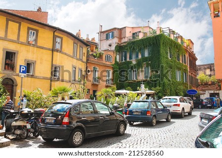 ROME, ITALY - MAY 03, 2014: Cars parked outside the restaurant in Rome, Italy