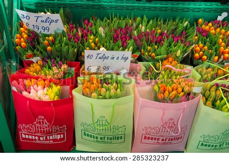 Amsterdam Schiphol, Netherlands - April 18, 2015: Selling colorful Dutch tulips in the bags, the Netherlands
